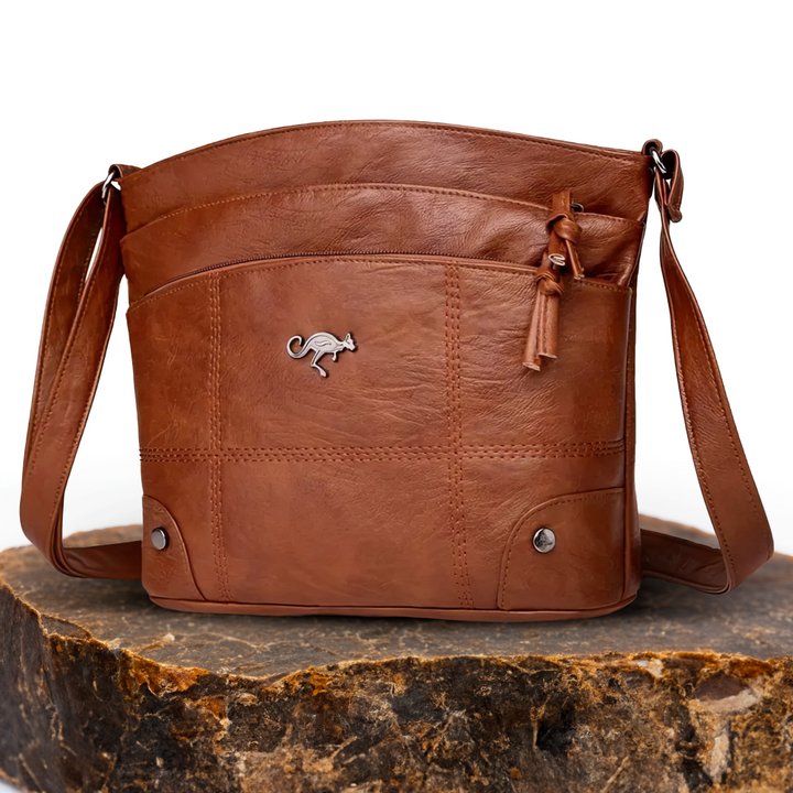 Silvia - Bolsa Cruzada Emblema Canguro