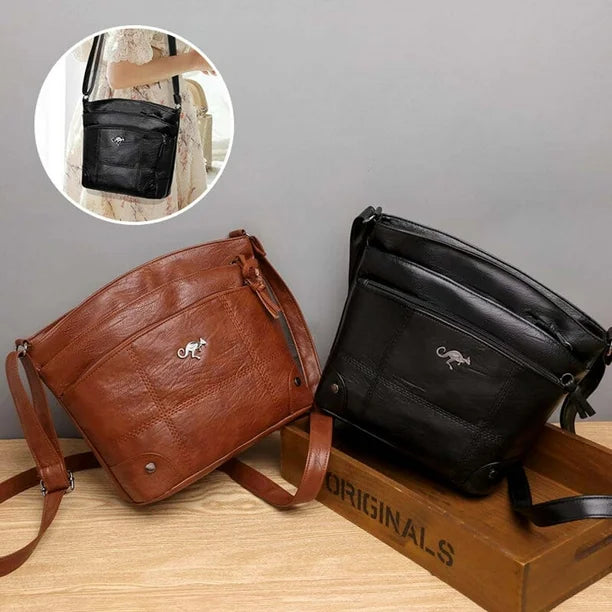Silvia - Bolsa Cruzada Emblema Canguro